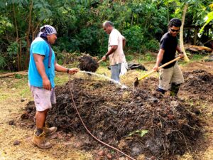 Turning compost pile