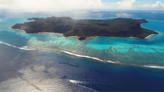 Aerial view of Naitauba Island and surrounding reef.