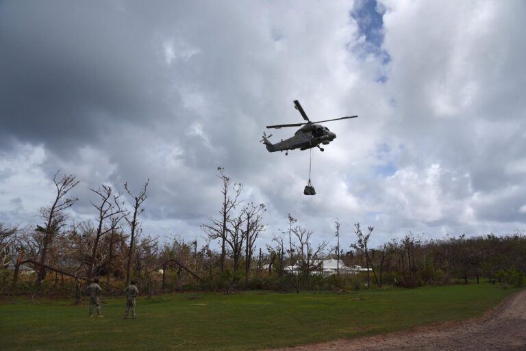 New Zealand Navy helicopter delivering relief supplies for our Fijian friends in Ciqomi.