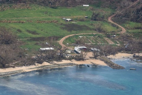 Aerial photograph of the island boat on its side. The photo was published by the Fijian government February 24th, 2016.