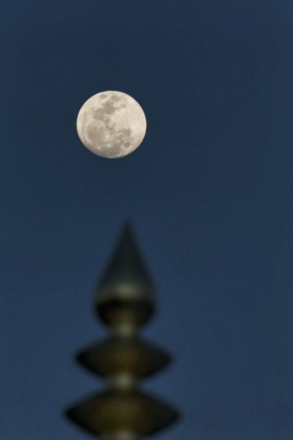 Temple spire and moon