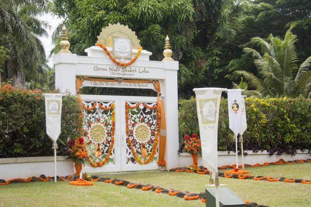 The "Brightness" Gates adorned with flowers and banners