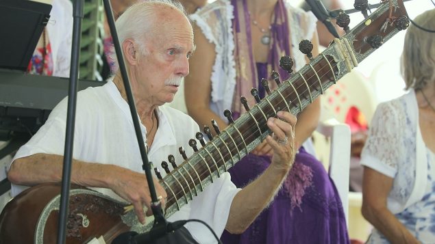 Devotee playing sitar