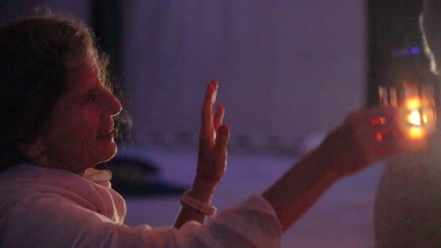 Devotee waving candle